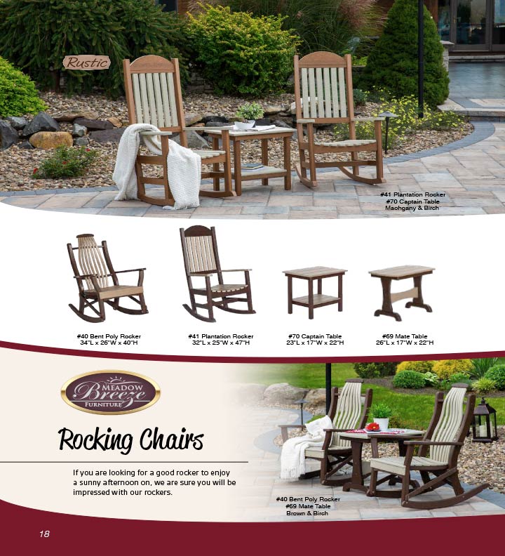 Two rocking chairs before a rock garden.